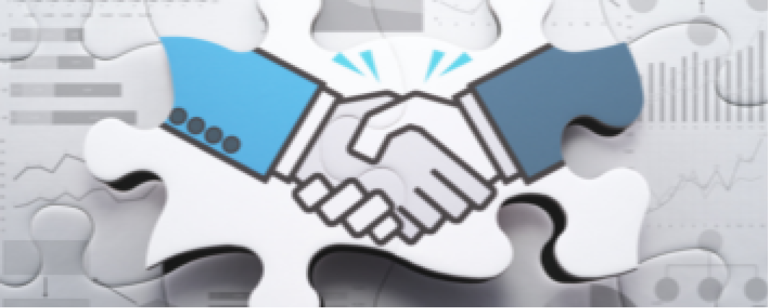 Pacto de dos manos sobre dos piezas de puzle