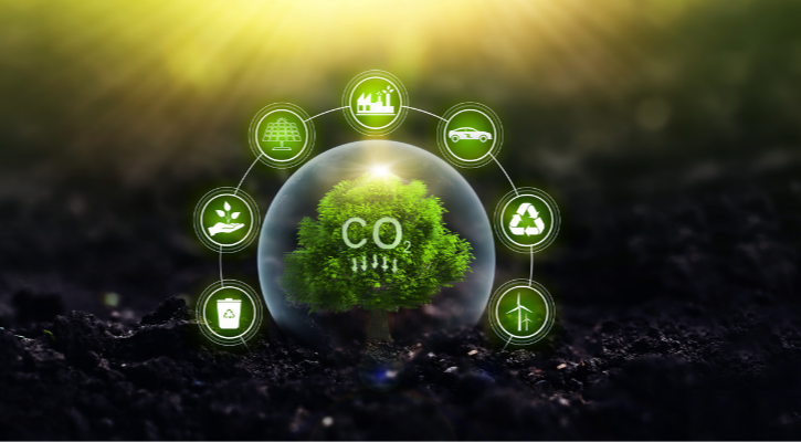 Burbuja que contiene el símbolo CO2 rodeada de símbolos de sostenibilidad