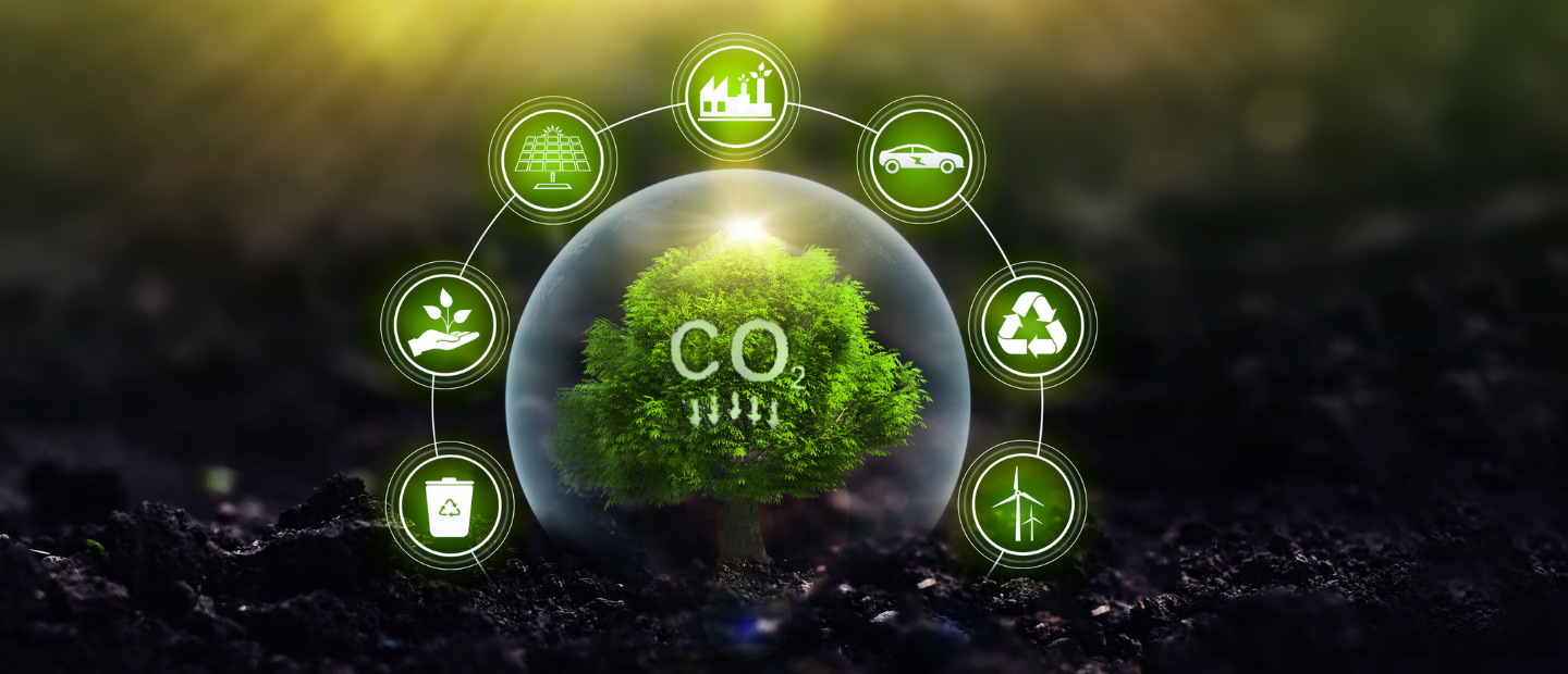 Burbuja que contiene el símbolo CO2 rodeada de símbolos de sostenibilidad